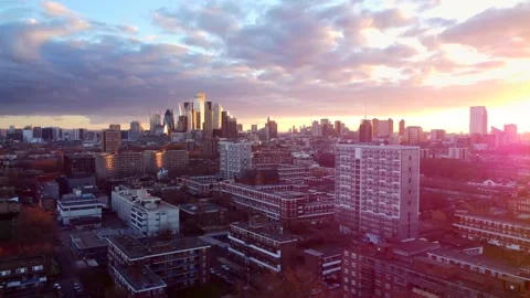Dramatic aerial flight over London with a stunning sunset in the background.. Stock Footage 334935989