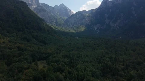 Dramatic Aerial Flyover of Forested Valley in Cloud Shadows below Prenj Mountain 스톡 동영상 342939771