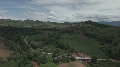Dramatic Aerial Panorama of Layered Hills, Plowed Slopes and Iconic Rocky M.. Stock Footage 337532256