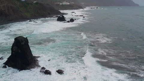 Dramatic aerial perspective of the Atlantic Ocean with powerful waves and white Stock Footage 331464349