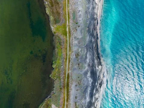 Dramatic aerial perspective highlighting ecological and water contrasts. Ex.. Stock Photos