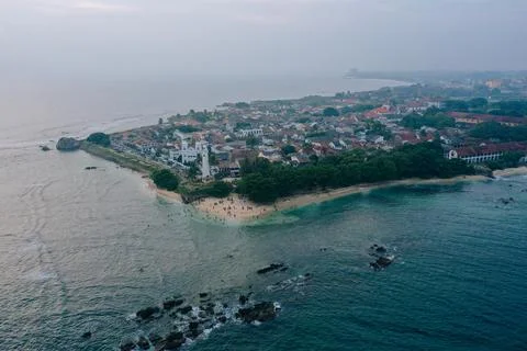 Dramatic aerial perspective of a historic peninsula. The ancient coastal city Stock Photos