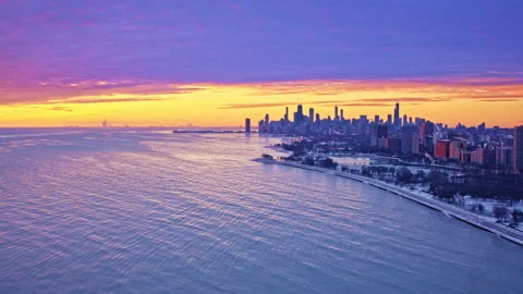 Dramatic aerial perspective over skyline and lakeshore Stock Footage 331052921