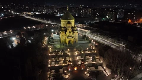 Dramatic aerial perspective of Saint John the Baptist Church at night. Video stock 329181141