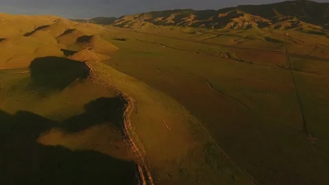 Dramatic Aerial Rolling Hills Of Central California Golden Light at Sunrise Stock Footage 146550506