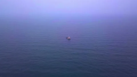 Dramatic Aerial Shot Of Sailboat Alone In The Ocean Stock Footage 204872239