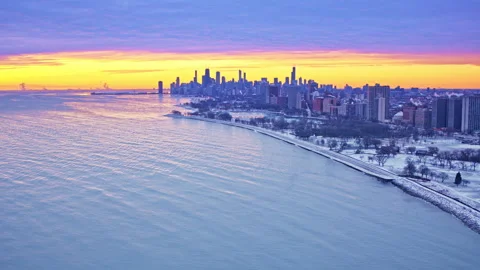 Dramatic aerial shot sweeping across urban skyline beside Lake Michigan Stock Footage 331043426
