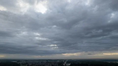 Dramatic Aerial Sky Over Forest Village 写真素材