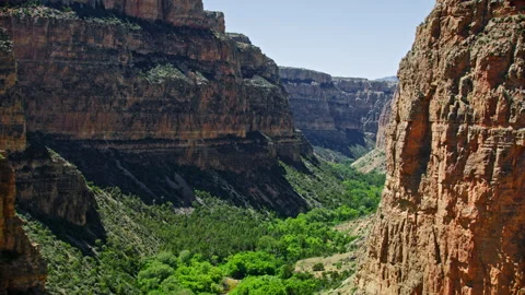 Dramatic aerial view deep inside a steep Canyon near Big Horn Canyon, Montana Stock-Footage 260752558