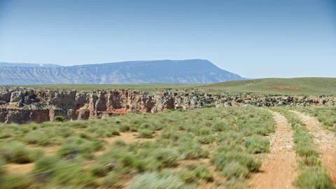 Dramatic aerial view deep inside a steep Canyon near Big Horn Canyon, Montana Stock-Footage 260752585