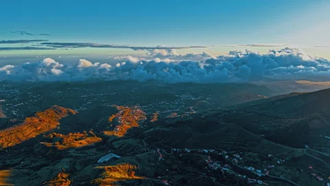 Dramatic aerial view of Gran Canaria's mountainous landscape at sunset Stock Footage 296923730