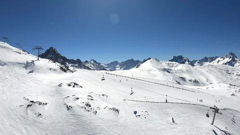 A dramatic aerial view of ski chair lift in the French Alps Stock Footage 105439385