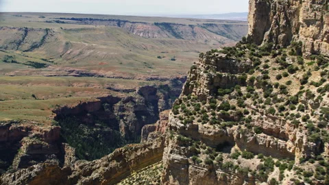 Dramatic aerial view of a steep Canyon near Big Horn Canyon, Montana Stock-Footage 260746182