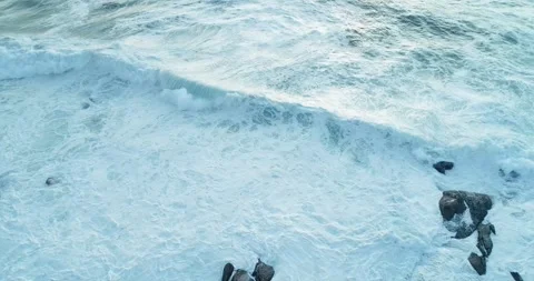 Dramatic aerial view of a stormy sea with chaotic wave patterns Vídeo Stock 331474319