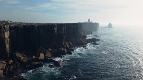 Dramatic aerial view of the towering rocky cliffs of Cabo Carvoeiro Video stock 321979472