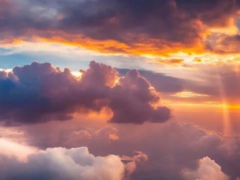 Dramatic amazing sky and clouds from above at sunset.Colorful pastel sky ba.. Stock Photos