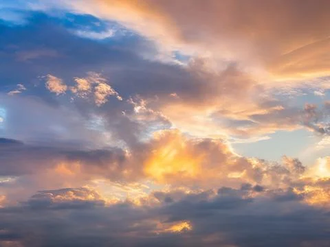 Dramatic amazing sky and clouds from above at sunset.Colorful pastel sky ba.. Stock Photos