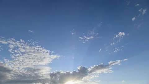 Dramatic and Beautiful Cloud Patterns Set Against a Clear Blue Sky, a Scenic Por 写真素材