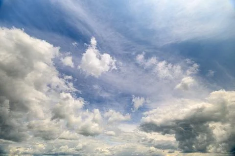 A Dramatic and Beautiful Cloudscape Paints the Sky Above with a Vibrant Blu.. Stock Photos