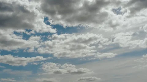 A Dramatic and Beautiful Cloudy Sky Showcasing Striking Blue Patches That Stock Footage 308728079