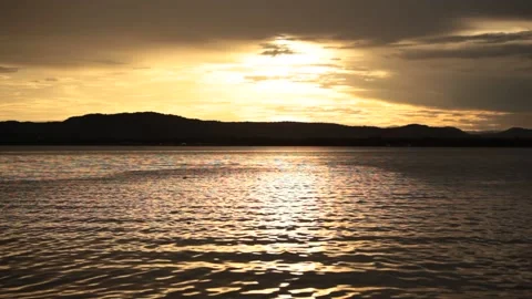Dramatic and Beautiful Sunrise or Sunset at the Sea and River. Stock Footage 209814498