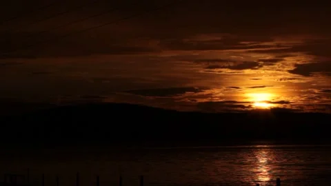 Dramatic and Beautiful Sunrise or Sunset at the Sea and River. Stock Footage 209816893