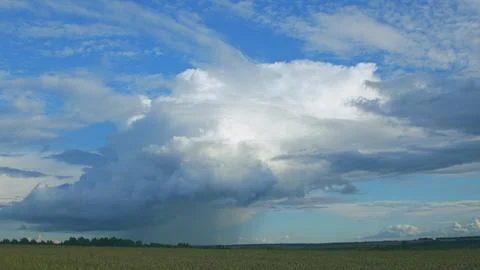 Dramatic and captivating Cloud Formation Over a Stunningly Scenic Landscape and 写真素材