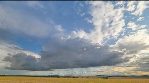 Dramatic and captivating cloud patterns are beautifully displayed over vast open Foto stock