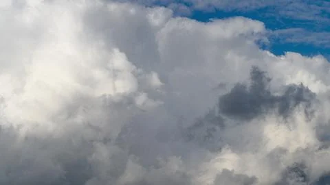 Dramatic and Captivating Cloudscapes Against a Beautiful Blue Sky Filled with Wo Stock Photos