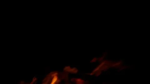 Dramatic and Captivating Flames Flickering in the Enveloping Darkness Fire Motio Stockfoto's