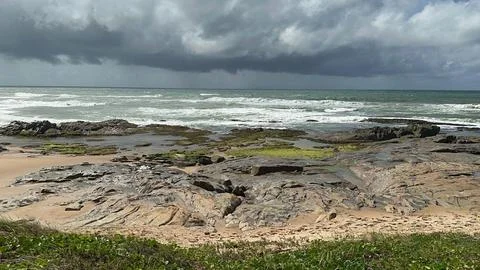 Dramatic and cloudy coastal landscape Stock Photos