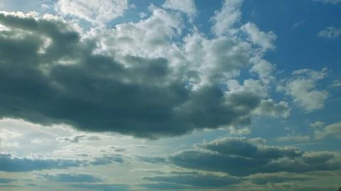 Dramatic and Exquisite Cloud Formation in a Bright and Vibrant Sky Above the Lan Stock Photos