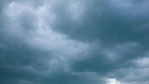 The Dramatic and Overcast Cloudy Sky is a striking scene filled with dynamic emo Stock Photos