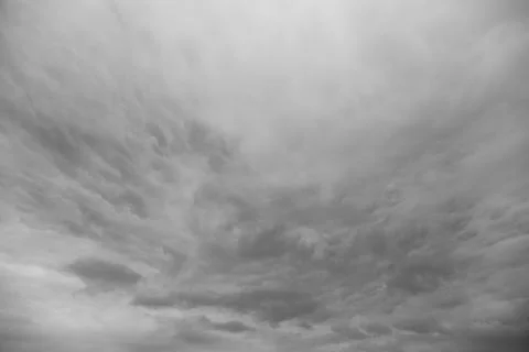 Dramatic and Striking Cloud Formation Set Against a Monochrome Sky with Rich Lay Stock Photos