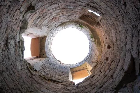 A dramatic and unique low-angle, wide-lens view from the base of a towering s Stock Photos