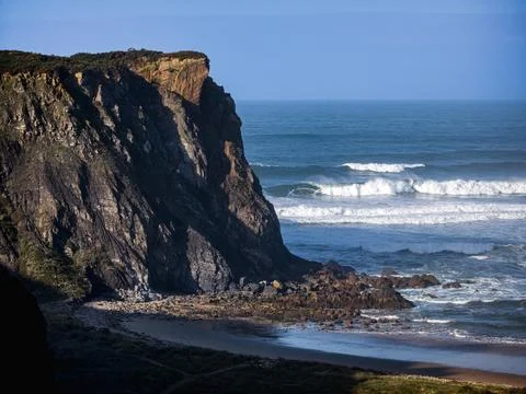 Dramatic Atlantic Cliff and Waves in Nieva, Asturias, Spain Stock Photos