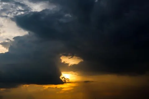 Dramatic atmosphere panorama view of artistic golden twilight sky and clouds. Stock Photos