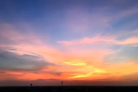 Dramatic atmosphere panorama view of summer twilight sky and clouds landscape Stock Photos