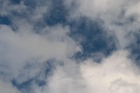 Dramatic atmospheric visuals. Cloud formations evoke strong emotions. Rich .. Stock Photos