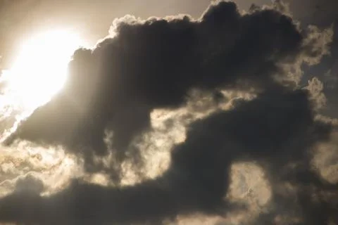 Dramatic backdrop of the with clouds and sun Stock Photos