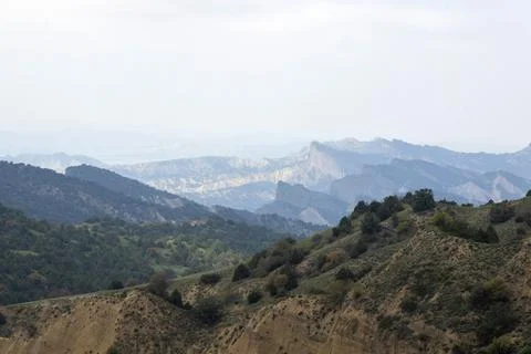 Dramatic badland formations and rugged canyons dominate the landscape of Va.. Stock Photos