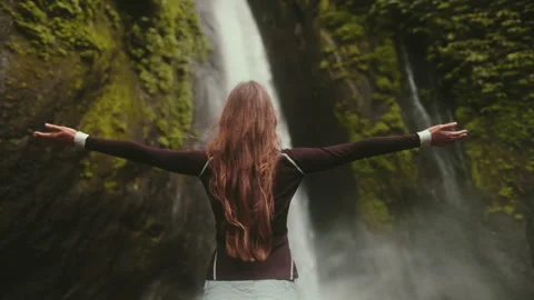 Dramatic Bali jungle waterfall landscape slow mo Stock Footage 274563719