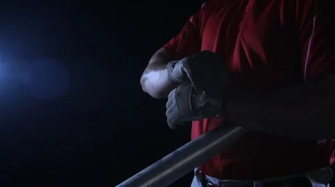 Dramatic baseball player, adjusts gloves, prepares to bat, HIGH SPEED SHUTTER Stock Footage 49622612