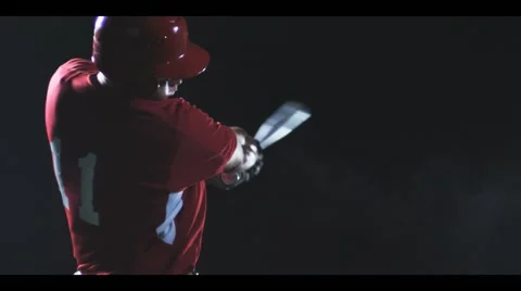 Dramatic baseball player, awaits pitch, hits ball, SLOW MOTION Stock Footage