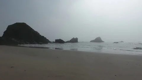 Dramatic beach with fog over ocean Video stock 70589485