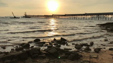 Dramatic beautiful sunset at sea and beach awesome sun golden reflection on wave Video stock 89216275