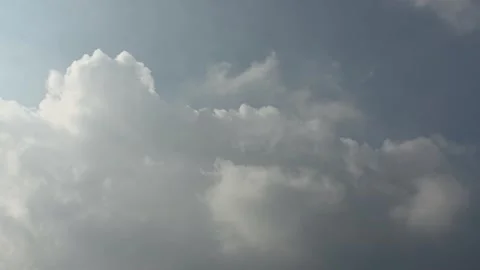 Dramatic Billowing Cumulus Clouds in a Summer Sky Video stock 341621406