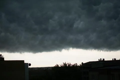 Dramatic black and blue storm clouds. Storm cloud. Black sky, storm weather. 스톡 사진