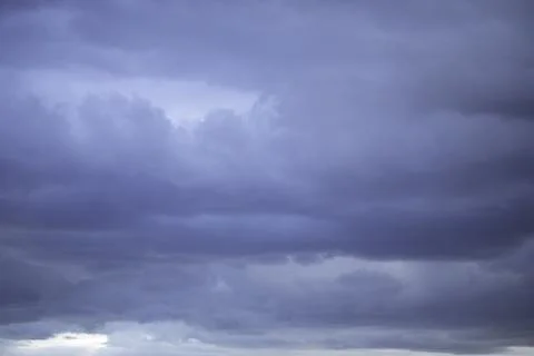 Dramatic black and blue storm clouds. Storm cloud. Black sky, storm weather. Stock Photos
