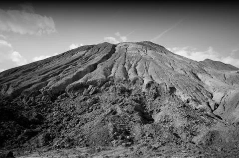Dramatic black and white mountain of sand landscape backdrop Stock Photos